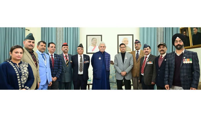 LG Manoj Sinha Interacts with Armed Forces Veterans, Contributes to Flag Day Fund